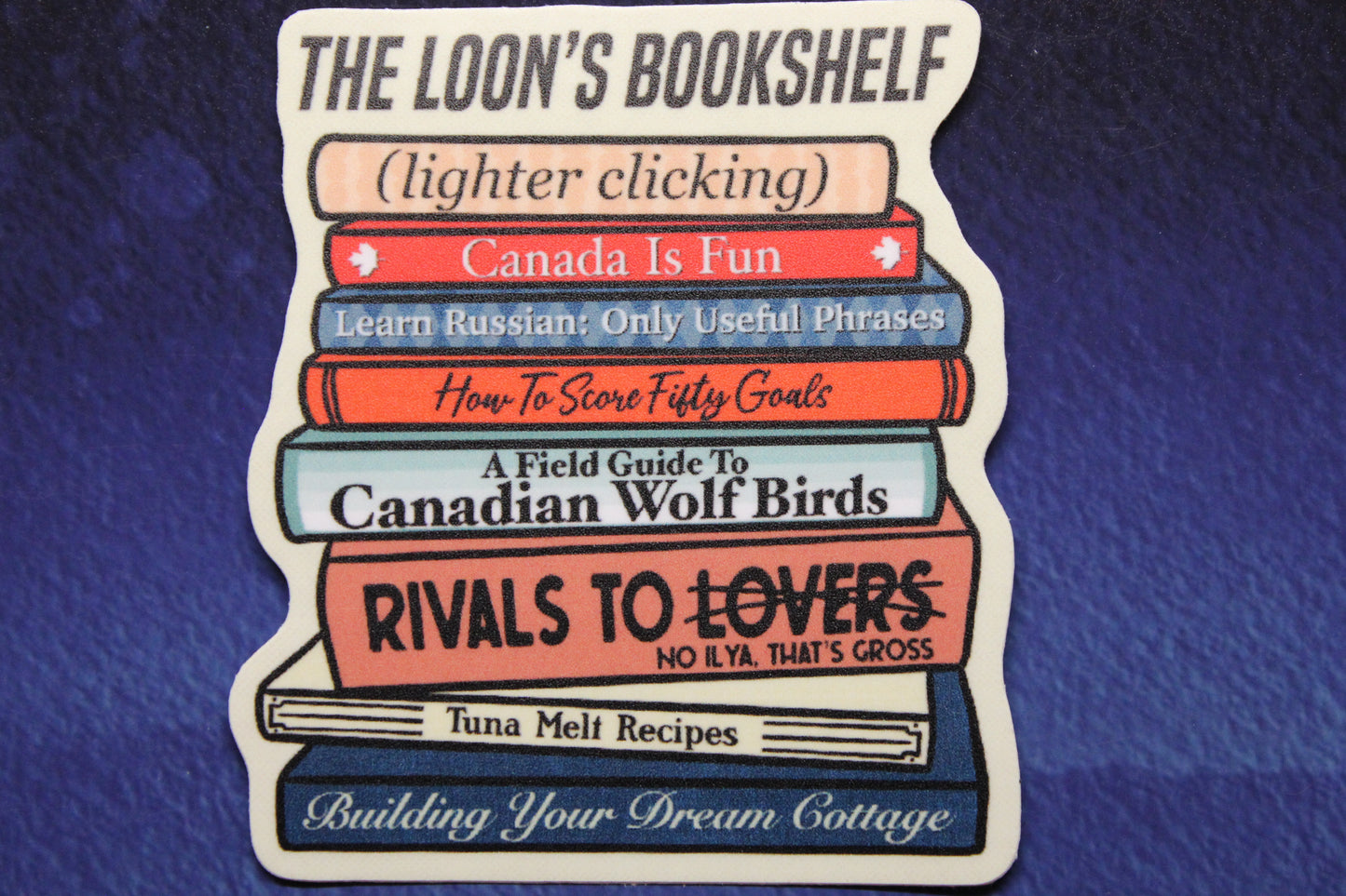 The Loon's Bookshelf Vinyl Sticker